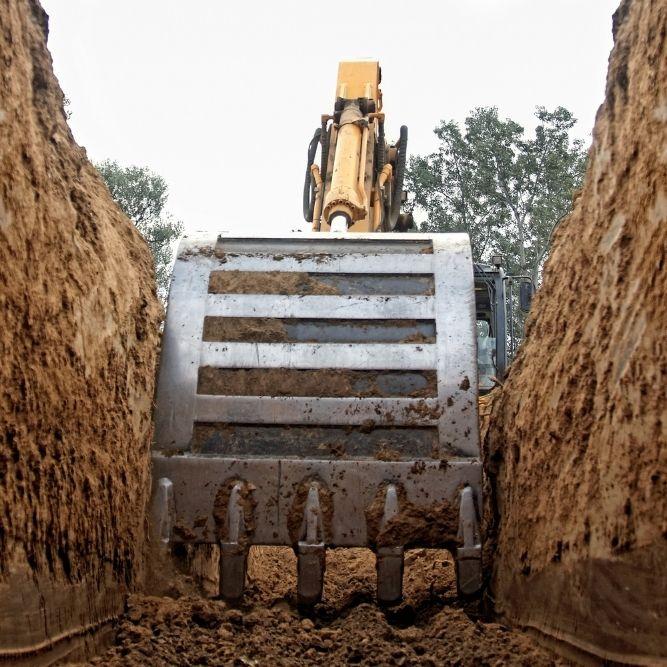 image of an excavator digging the ground