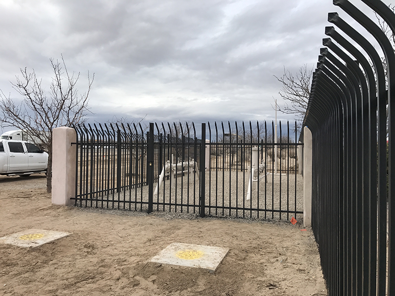 an image of Finished Iron Fence and Gravel